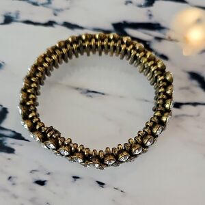 Gold J. Crew stretch bracelet with clear crystals